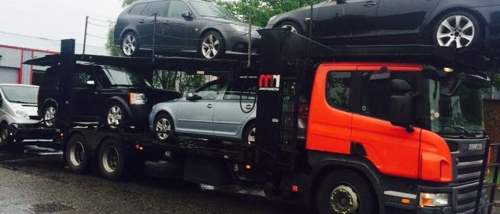 Scrap and salvage cars being collection in Reading